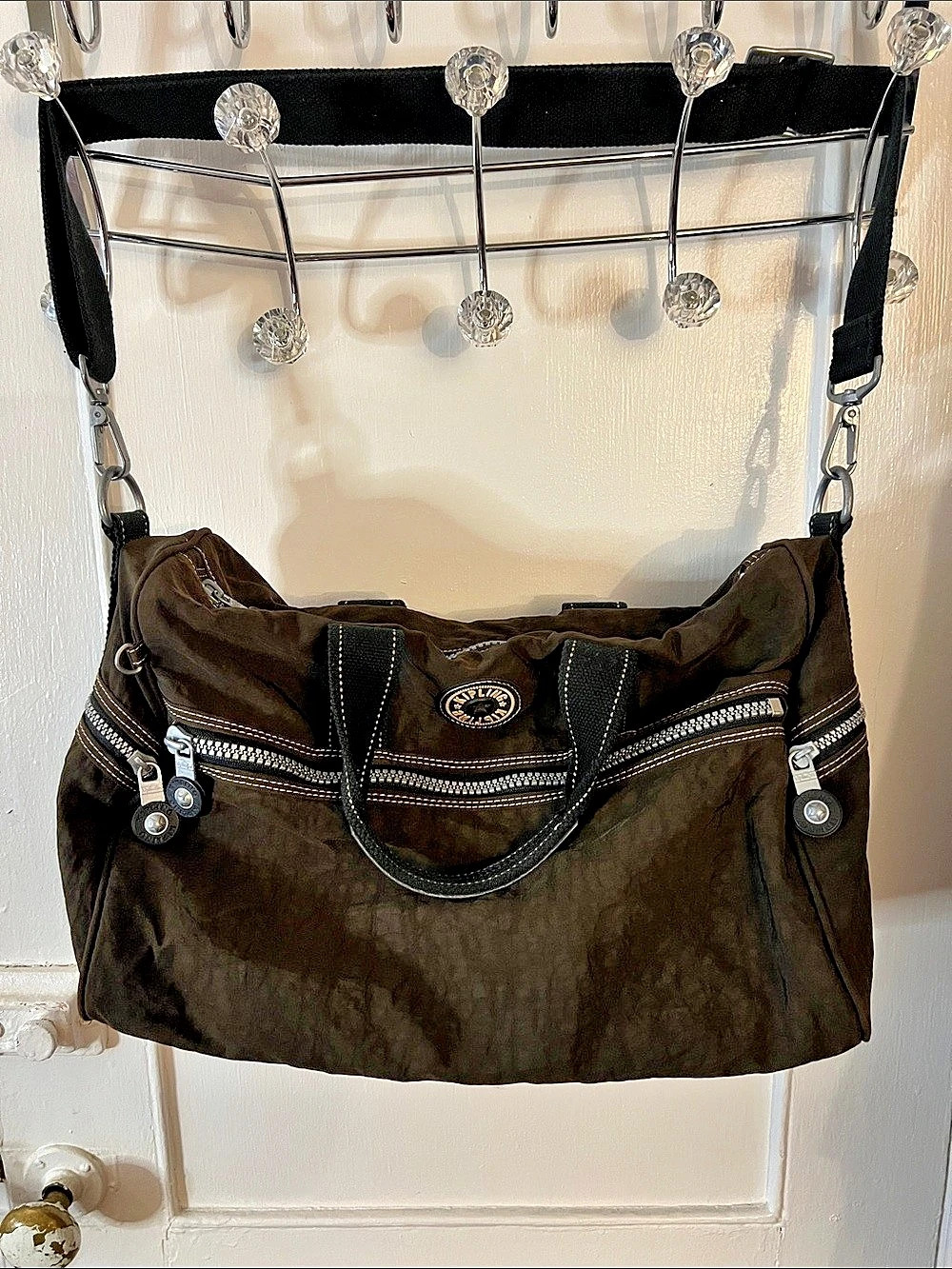 Kipling Brown mini duffel cross body Bag
